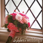 Bridal bouquet leaning against a window